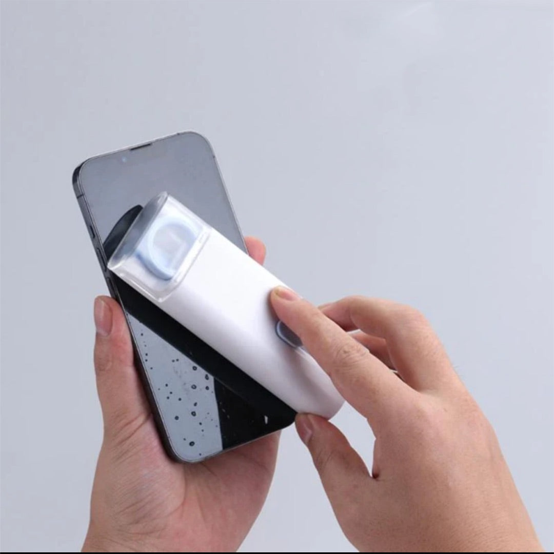 Hand holding a smartphone with a white device attached on a light gray background